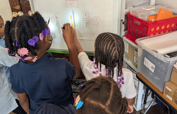  Students studying shadows